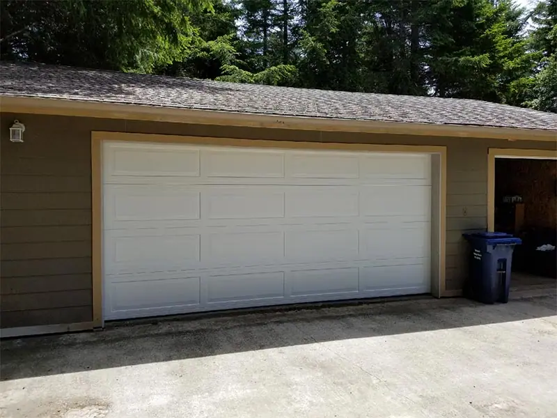 After: new white garage door