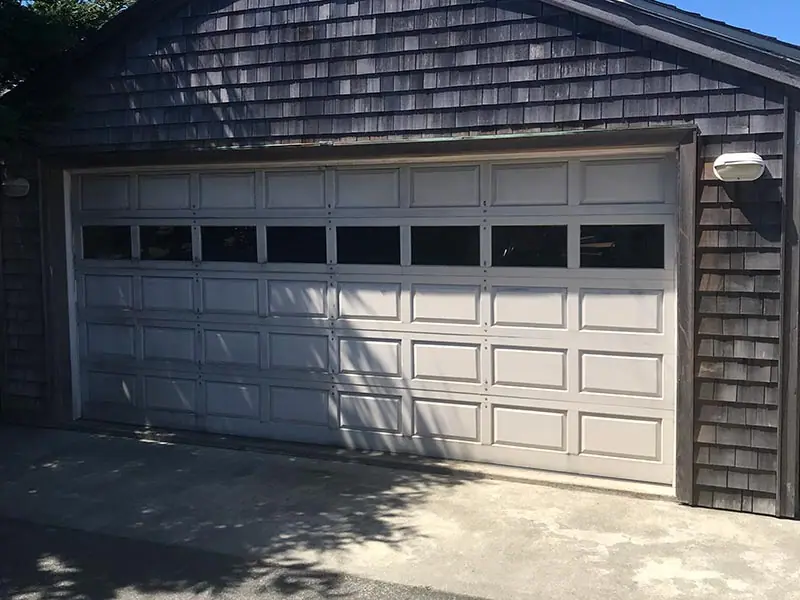 Before: old windowed garage door